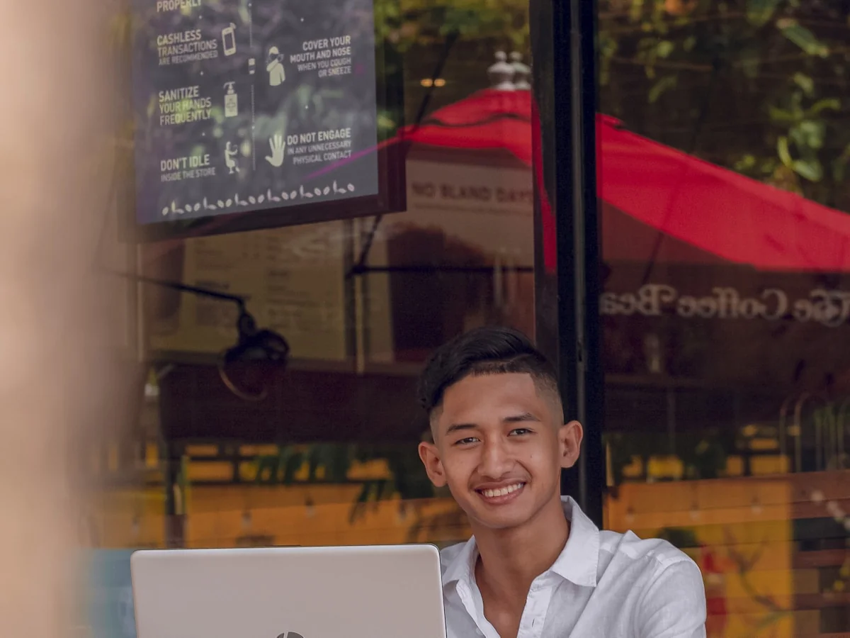 Filipino entrepreneur working on a laptop